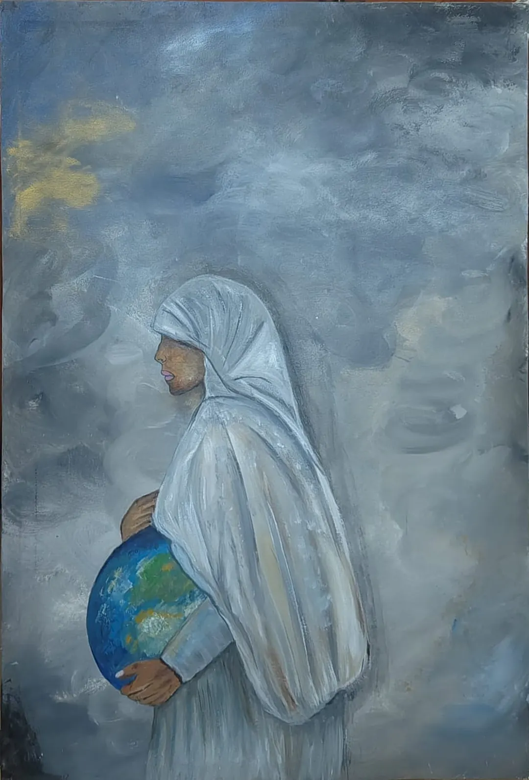 Mother Earth, a painting by Hafsa Imran: a woman in a white hijab and robe, seen in profile, holds the Earth against her body like a pregnant belly, beneath a stormy grey-blue sky with a patch of gold