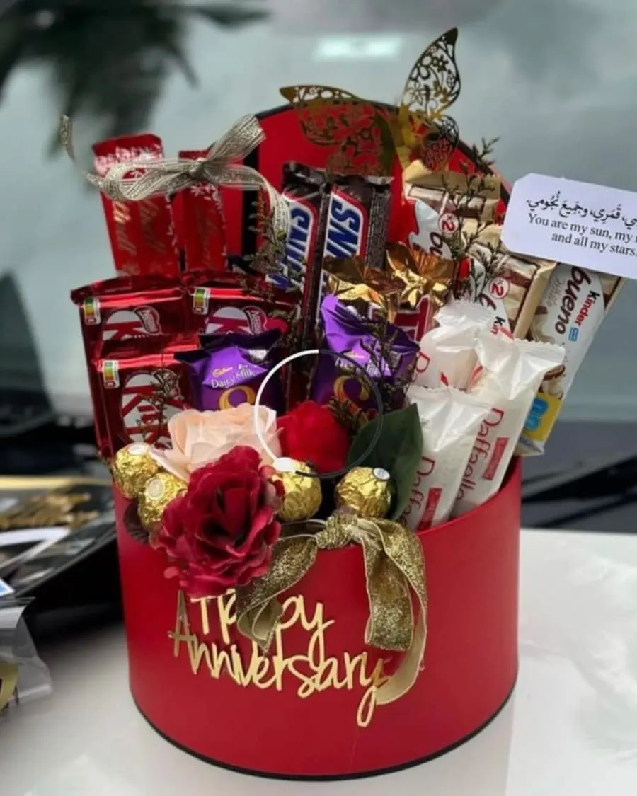 Premium chocolate arrangement with dried flowers and a handwritten Eid Mubarak card — handcrafted by Bloom & Beyond in Lahore