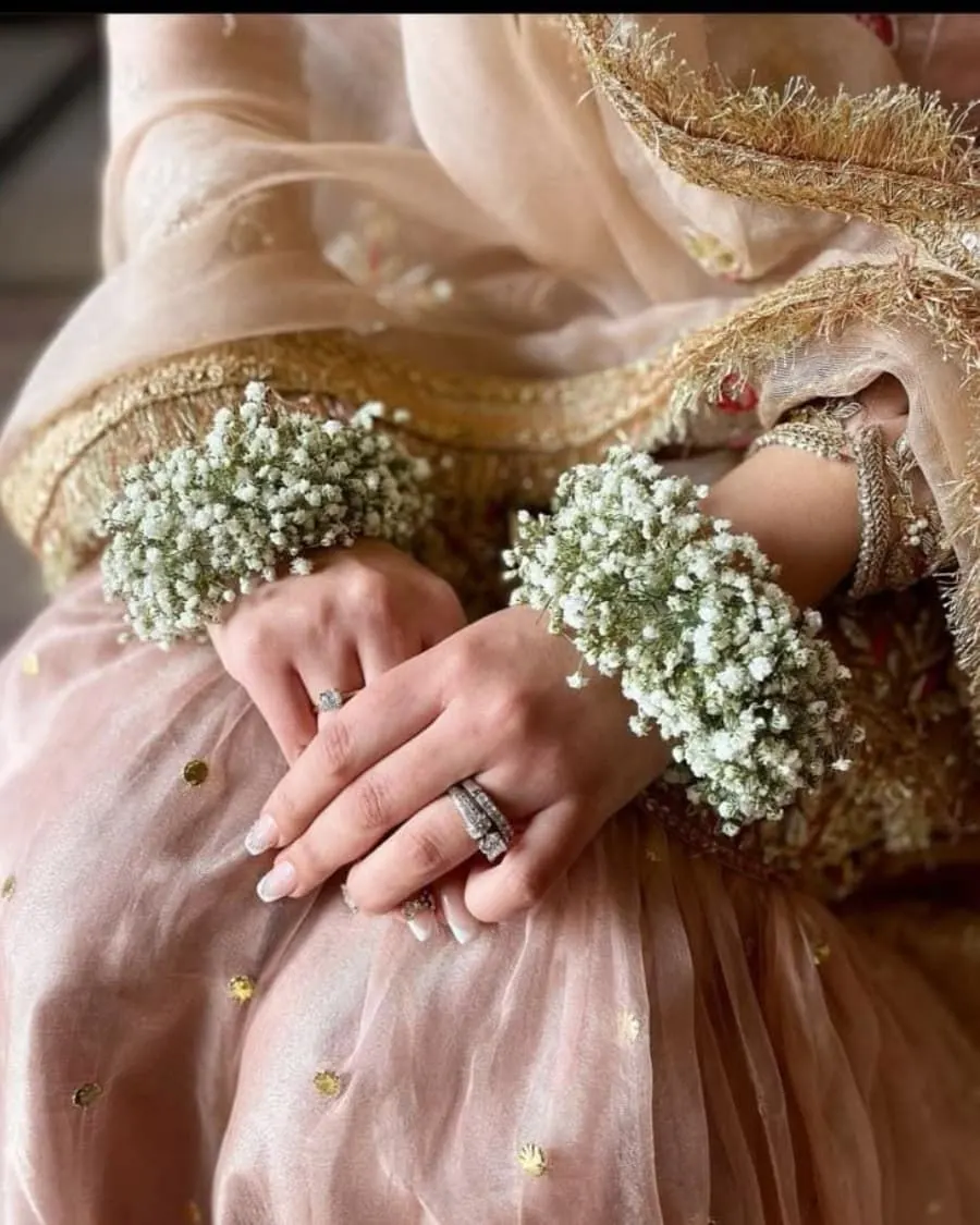 Delicate floral bangles made with fresh baby breath flowers wrapped on a wire base — handcrafted by Bloom & Beyond in Lahore