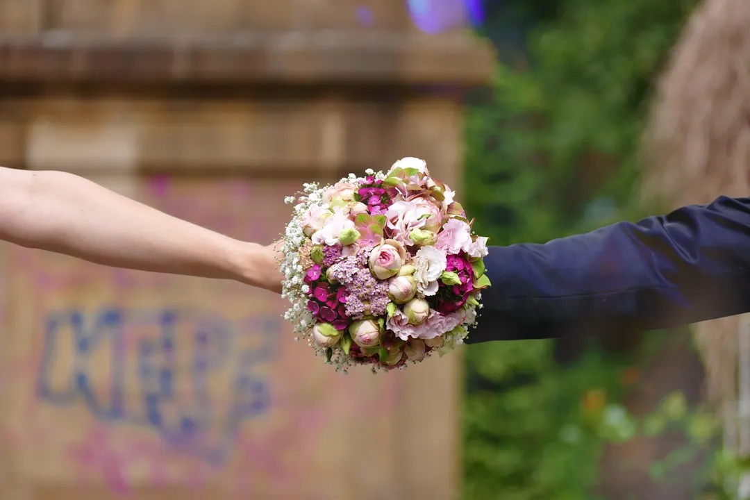 Petite hand-tied bouquets for bridesmaids, designed to complement the bridal bouquet — handcrafted by Bloom & Beyond in Lahore