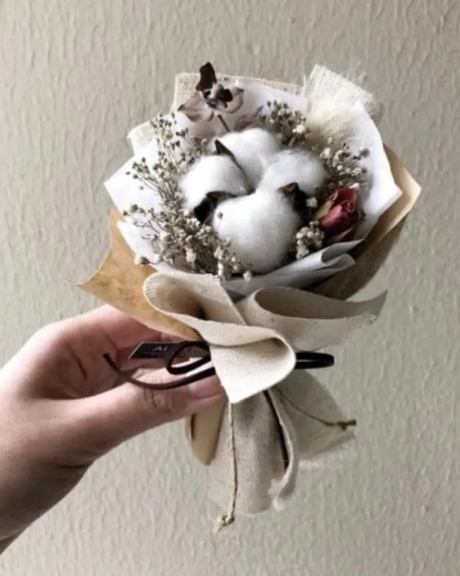 Natural cotton flower stems wrapped in burlap for a minimalist, rustic aesthetic — handcrafted by Bloom & Beyond in Lahore