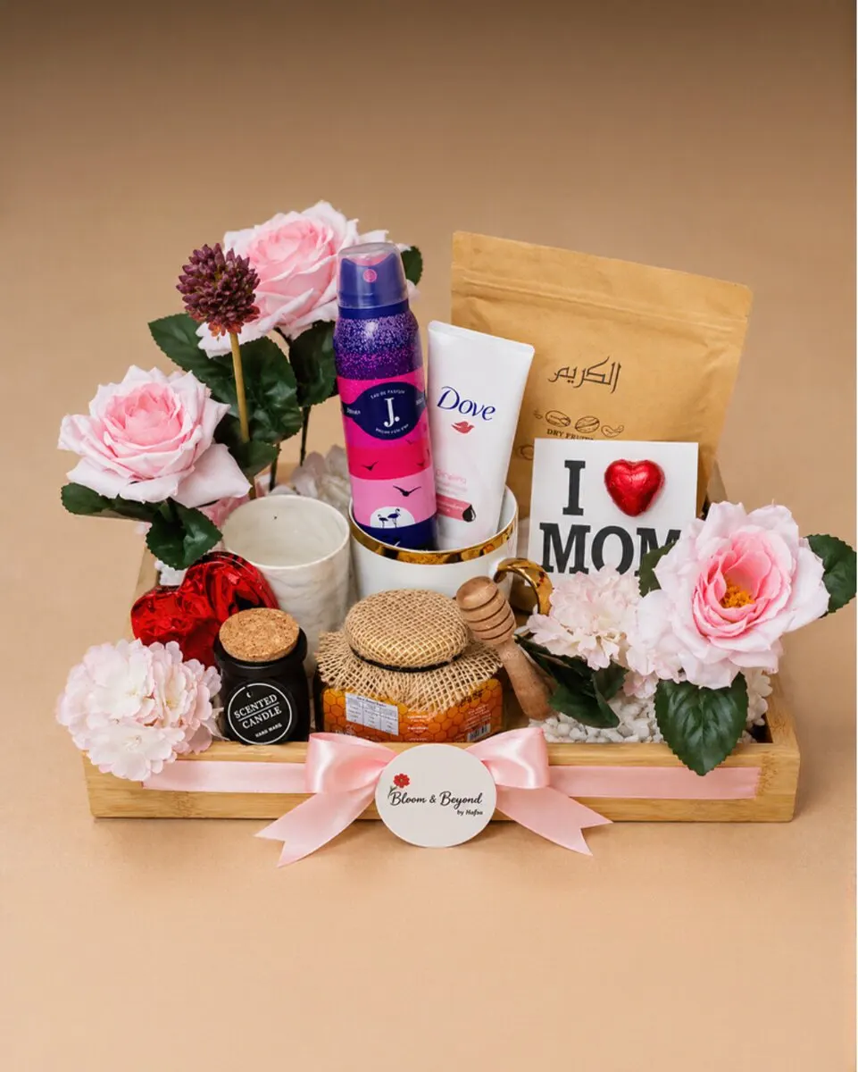 Perfume mist, a Bloom & Beyond scented soy candle, Lal's chocolate, and a personalised illustrated card — handcrafted by Bloom & Beyond in Lahore