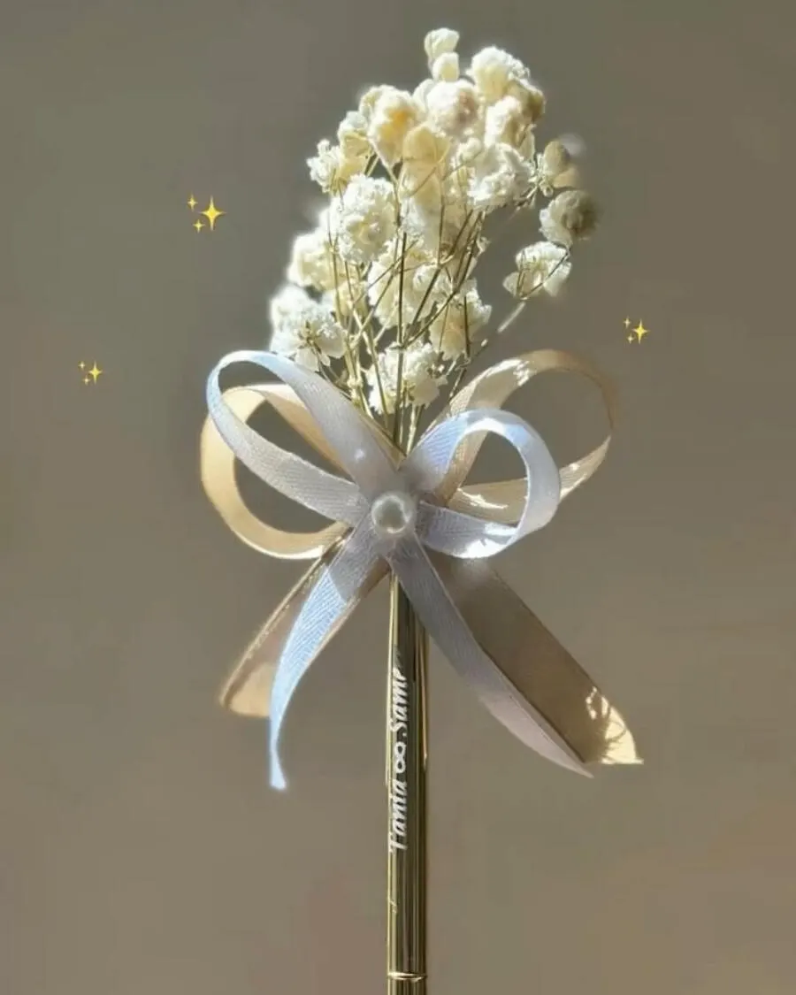 An elegantly decorated gold pen for the Nikkah signing ceremony — handcrafted by Bloom & Beyond in Lahore