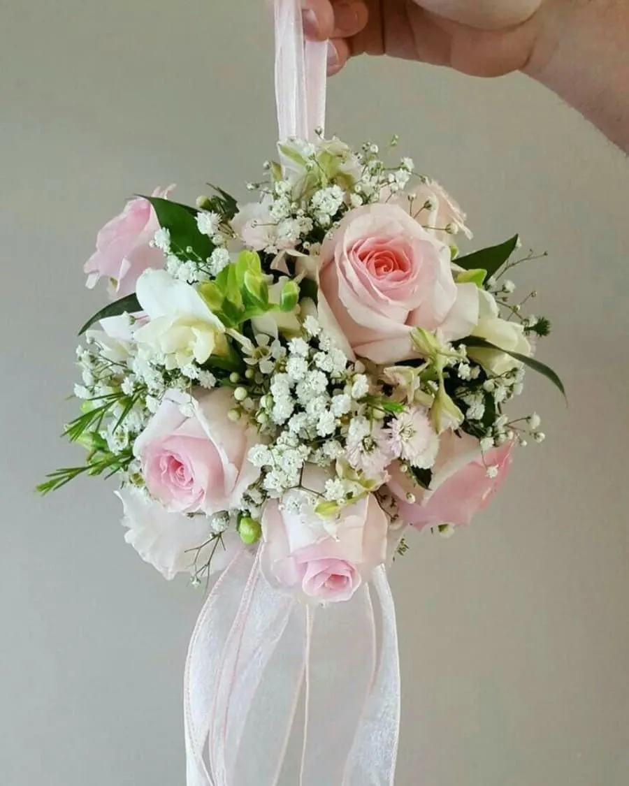 A beautiful sphere of pink roses — carry it as a flower girl pomander or hang as elegant wedding decor — handcrafted by Bloom & Beyond in Lahore