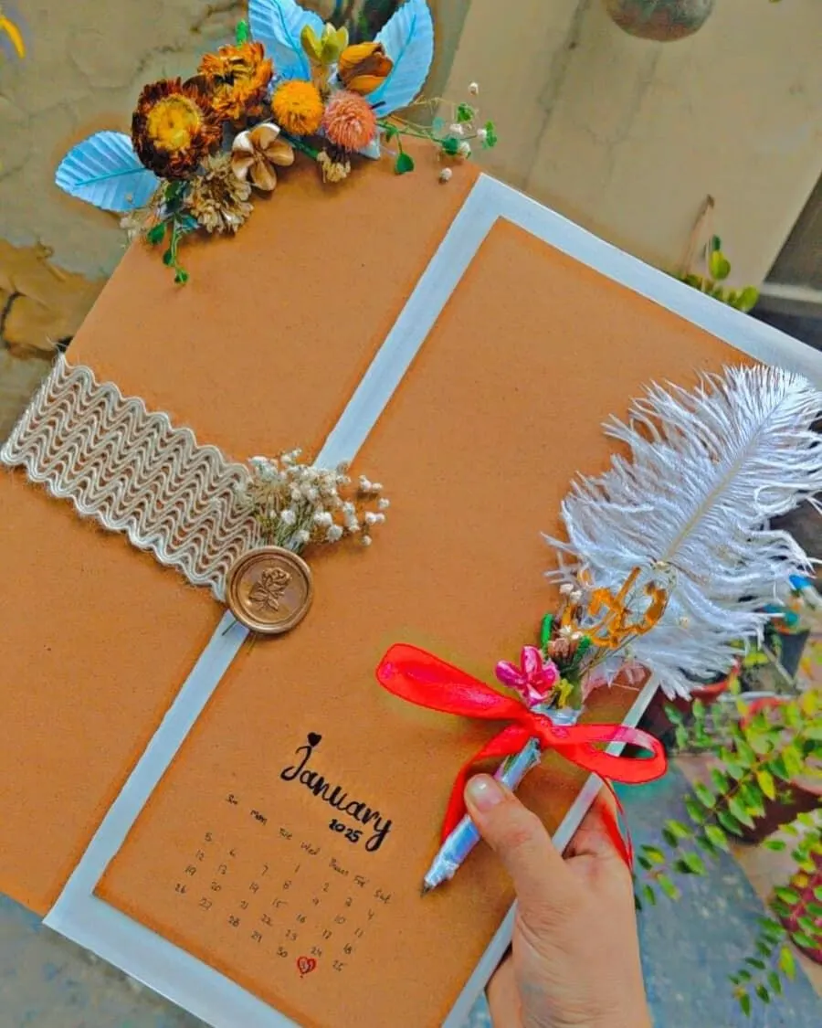 A vintage diary with a wax seal, dried flower accents, and a matching feather pen — handcrafted by Bloom & Beyond in Lahore