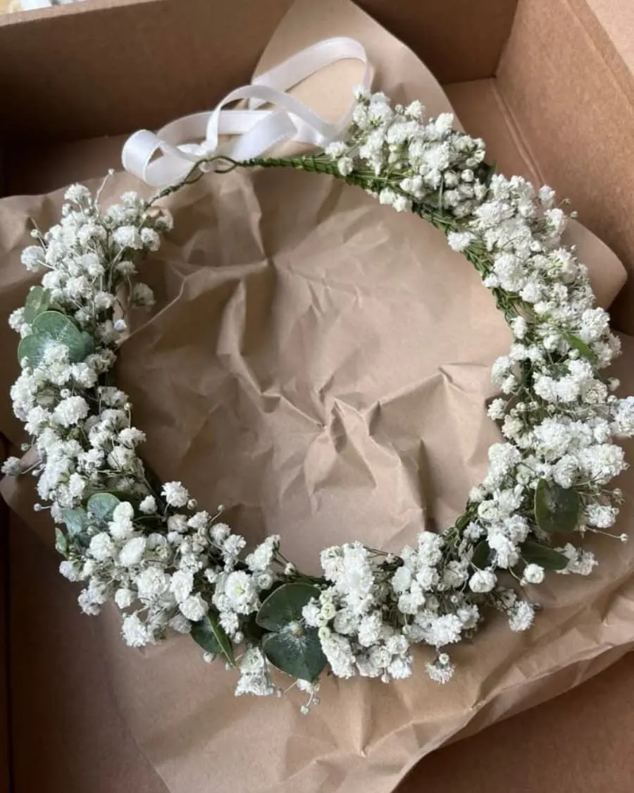A pristine white baby breath flower crown presented in a gift box — handcrafted by Bloom & Beyond in Lahore