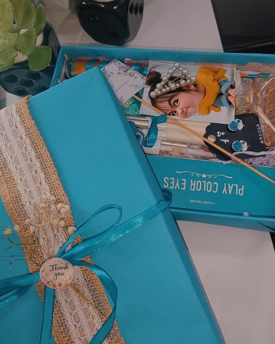 A thoughtful self-care package with dried flowers, artisan soap, scented candle, and tea — handcrafted by Bloom & Beyond in Lahore
