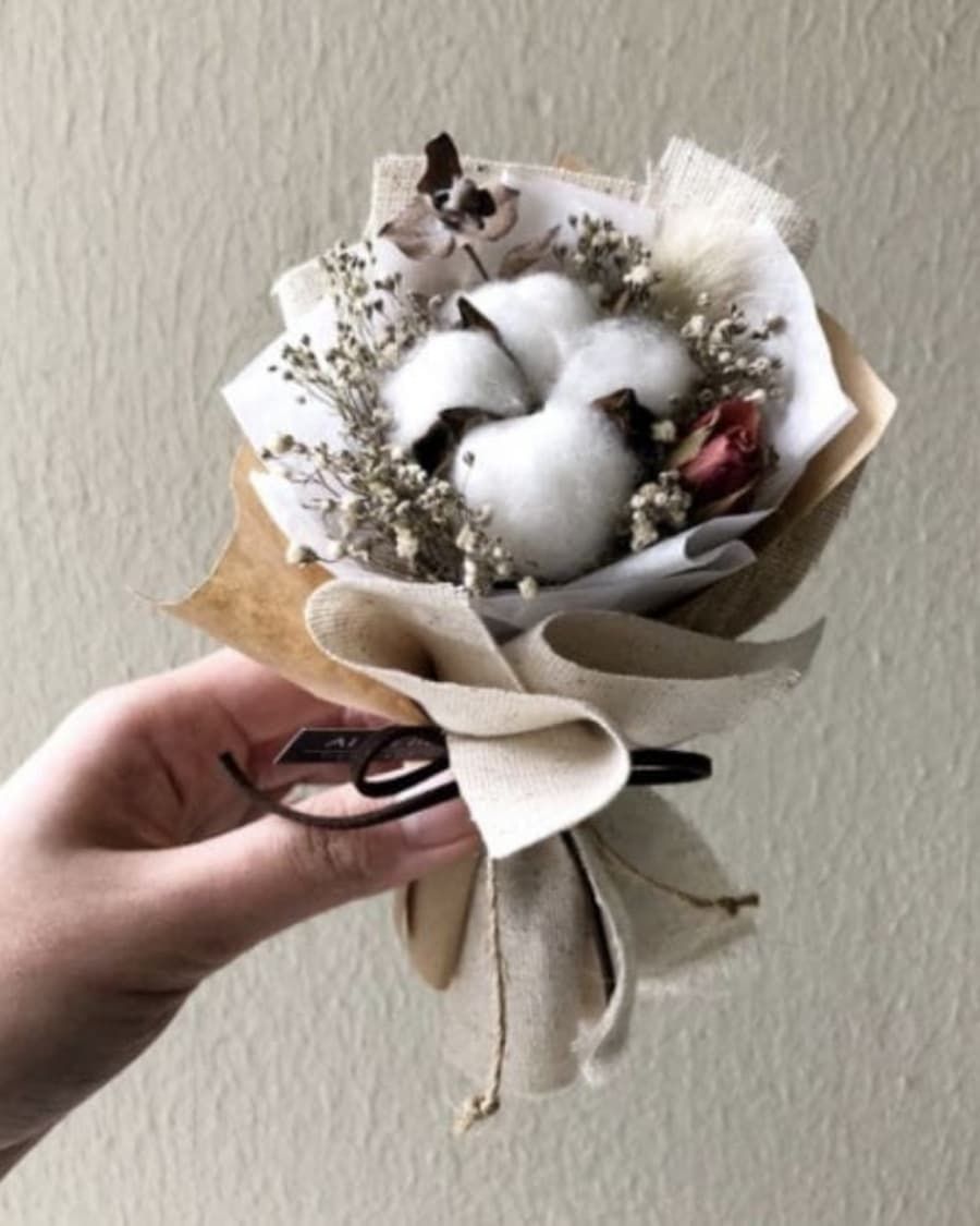 Natural cotton flower stems wrapped in burlap for a minimalist, rustic aesthetic — handcrafted by Bloom & Beyond in Lahore