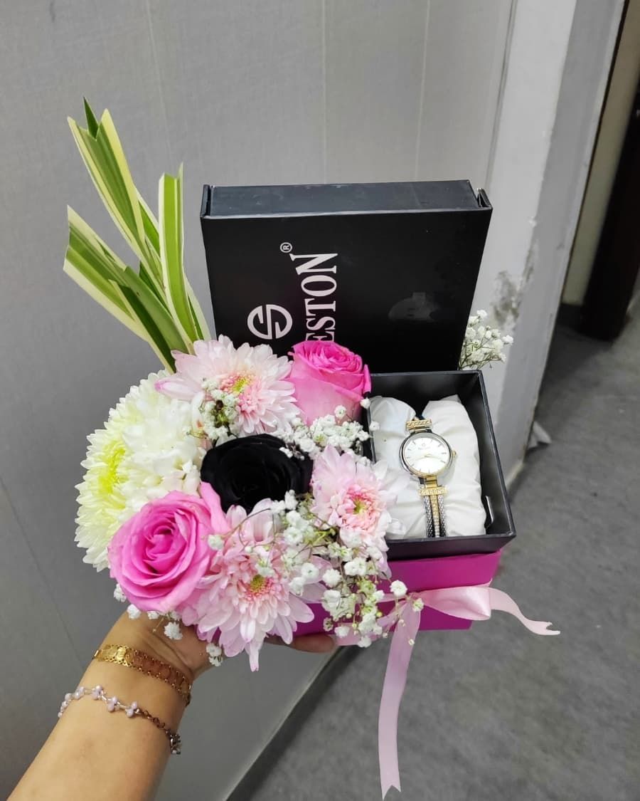 Watch and flower gift box — a wristwatch presented with pink flowers in a premium keepsake box — handcrafted by Bloom & Beyond in Lahore